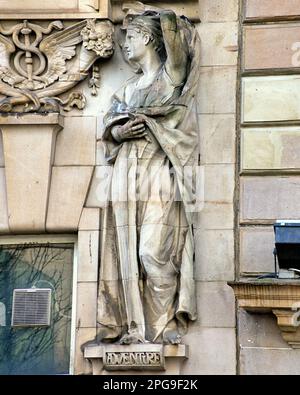 one of four sculptures of allegories the Allegory of  adventure by Phyllis Archibald on an old bank building in st enoch square Glasgow, , UK Stock Photo