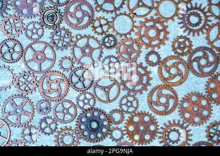 Lot of metal gears gray background Stock Photo