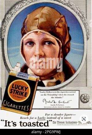 AMELIA EARHART (1897-1937) American aviator in a promotion for Lucky Strike  cigarettes about 1933 Stock Photo