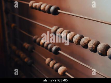 Vintage old accounting wooden abacus. Close up. Stock Photo