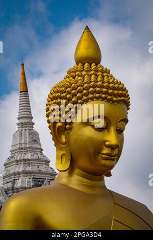 One of the many Buddha statues you see on the canal tours in Bangkok, Thailand. Stock Photo