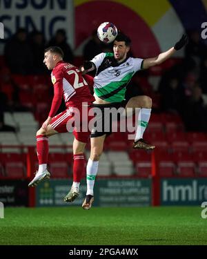 Accrington Stanley's Dan Martin and Plymouth Argyle's Finn Azaz (right) battle for the ball during the Sky Bet League One match at the Wham Stadium, Accrington. Picture date: Tuesday March 21, 2023. Stock Photo