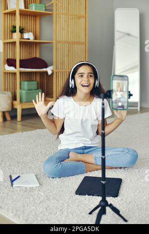 Happy preteen girl blogger record video for vlog, makes videocall, lead ...
