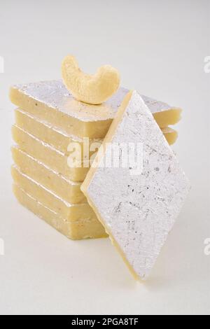 Closeup of kaju katli sweet isolated on white background Stock Photo