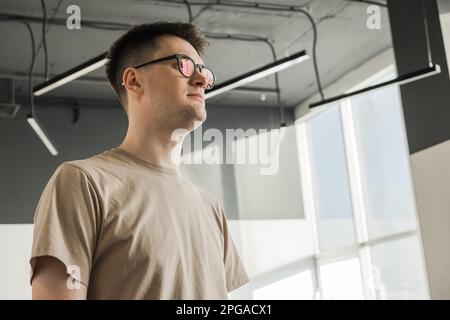 Modern Office: Portrait of Stylish Developer, Data Analysis and Creative Designer. Digital Entrepreneur Works on e-Commerce Startup Stock Photo