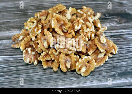 The walnut, an edible seed of any tree of the genus Juglans (family Juglandaceae), used as a snack and in desserts and sweets specially in Ramadan mon Stock Photo