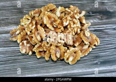 The walnut, an edible seed of any tree of the genus Juglans (family Juglandaceae), used as a snack and in desserts and sweets specially in Ramadan mon Stock Photo
