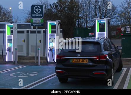 Car charging at Gridserve Electric Highway charging points, Cherwell Valley Moto services, M40 J10, A43, Oxfordshire, England, UK, OX27 7RD Stock Photo