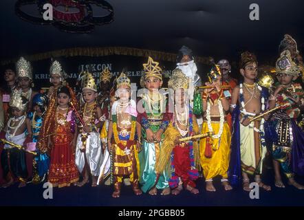 Boy and a girl in costumes in a religious festival of Krishna Janmashtami, Coimbatore, Tamil Nadu, India Stock Photo