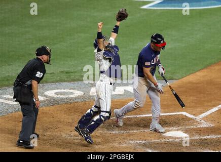 Miami, United States. 21st Mar, 2023. Japan catcher Yuhei Nakamura (C) celebrates a 3-2 win over team USA as Mike Trout of the Los Angeles Angels strikes out swinging during the ninth inning of the World Baseball Classic Final in Miami, Florida, Tuesday, March 21, 2023. Photo by Aaron Josefczyk/UPI Credit: UPI/Alamy Live News Stock Photo