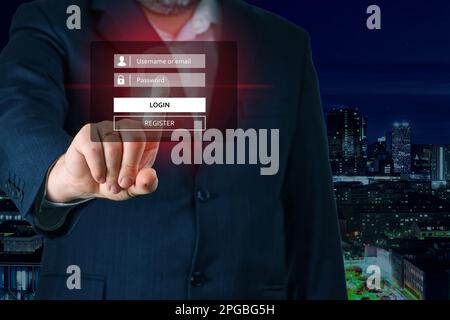 Businessman hand touching screen to login. Enter Username, Password for Login. Online Security Stock Photo