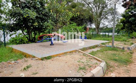 Bangalore,Karnataka,India-September 18 2022: Exercise equipment in Agara lake for senior citizens.Well maintained lake for walking, relaxation Stock Photo