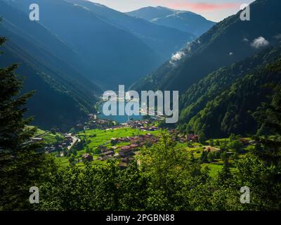 Turkey's famous tourist mountain lake. Long lake (Uzungöl) view from the top of the view in the morning light. Trabzon,Turkey Stock Photo