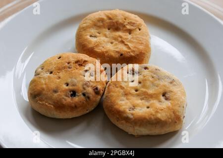 Traditional Lancashire Eccles Cakes, made with flaky pastry and currants Stock Photo