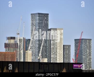 Manchester, UK, 22nd March, 2023.  High rise buildings at Deansgate Square, a skyscraper development in city centre Manchester, United Kingdom, against a blue sky. Stock Photo