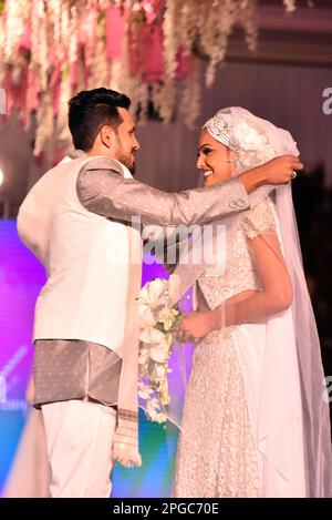 Colombo, Sri Lanka. 21st Mar, 2023. Models present creations during a wedding show in Colombo, Sri Lanka, on March 21, 2023. Credit: Gayan Sameera/Xinhua/Alamy Live News Stock Photo