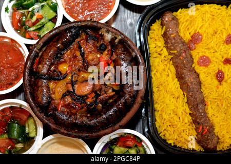 Traditional Egypt beef  Kofta, kebab and tarb kofta shish with mixture of lamb meat, sausage mumbar intestines filled with rice, kawareh trotters cow Stock Photo