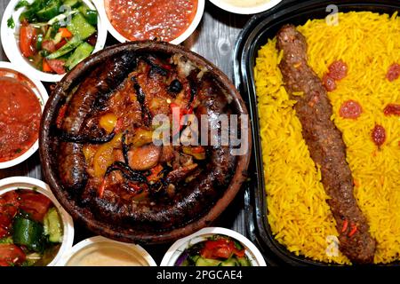 Traditional Egypt beef  Kofta, kebab and tarb kofta shish with mixture of lamb meat, sausage mumbar intestines filled with rice, kawareh trotters cow Stock Photo