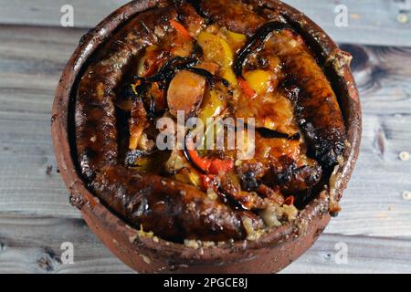 Traditional Egyptian mixture of lamb meat, sausage mumbar intestines filled with rice, kawareh trotters cow feet, pieces of cooked kidneys, hearts and Stock Photo