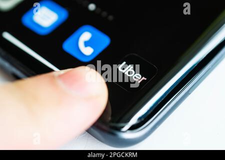 Barnaul. Russia June 20, 2022 Uber application icon on screen close-up. Uber app icon. Uber application icon on screen close-up. Uber app icon. Stock Photo