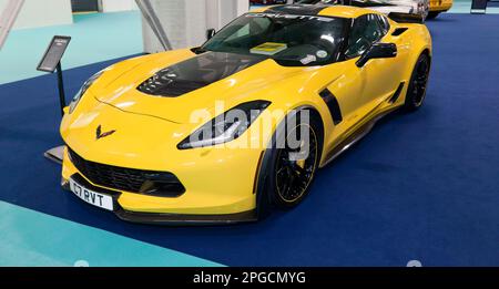 Three-quarters Front View of a Yellow, 2016, Chevrolet Corvette Z06, C7.R edition, on display at the 2023 London Classic Car Show Stock Photo
