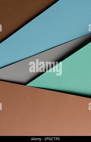 From above layout of colorful cardboard sheets in brown, grey and blue shades Stock Photo