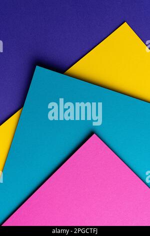 From above layout of colorful cardboard sheets in blue, purple, pink and yellow shades Stock Photo