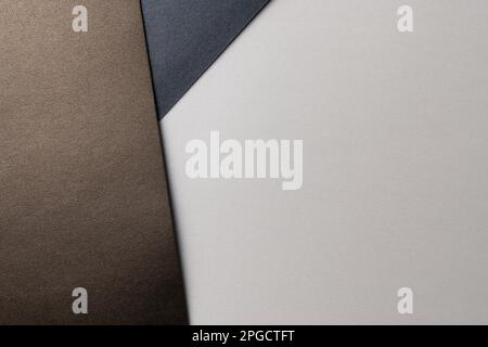 From above layout of colorful cardboard sheets in brown and grey shades Stock Photo