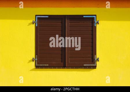 Colorful facade with closed window Stock Photo