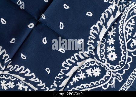 Navy blue bandana with white pattern background close up Stock Photo