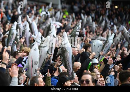 Grimsby Town fans are seen with Harry the Haddock inflatables - Brighton & Hove Albion v Grimsby Town, The Emirates FA Cup Quarter Final, Amex Stadium, Brighton, UK - 19th March 2023  Editorial Use Only - DataCo restrictions apply Stock Photo