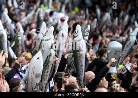 Grimsby Town fans are seen with Harry the Haddock inflatables - Brighton & Hove Albion v Grimsby Town, The Emirates FA Cup Quarter Final, Amex Stadium, Brighton, UK - 19th March 2023  Editorial Use Only - DataCo restrictions apply Stock Photo