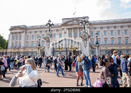 People gather around Buckingham Palace on the first Saturday since the state funeral of the late Queen Elizabeth II. Stock Photo