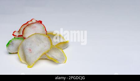 colorful crackers isolated on white background - indonesian crackers very tasty Stock Photo