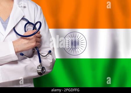 Indian medicine and healthcare concept. Doctor close up against flag of India background Stock Photo