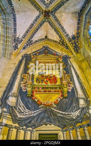 BERN, SWITZERLAND - MARCH 31, 2022: The large bas-relief of the Coat of Arms on the wall in prayer hall of Bern Minster, on March 31 in Bern, Switzerl Stock Photo