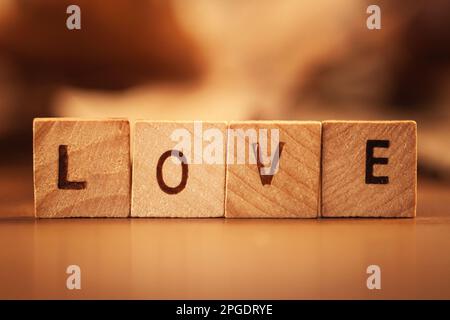 Close-up of wooden blocks spelling the word love Stock Photo
