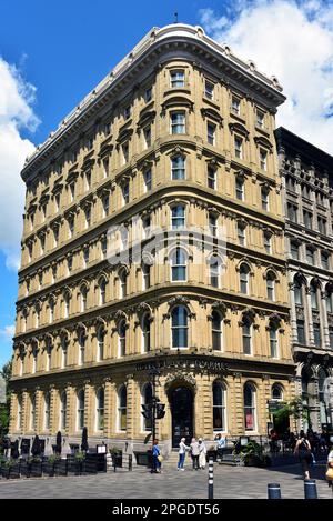 Montreal, Canada - July 31, 2021: The Hotel Place d'Armes in Old Montreal exhibiting 19th Century architecture. Stock Photo