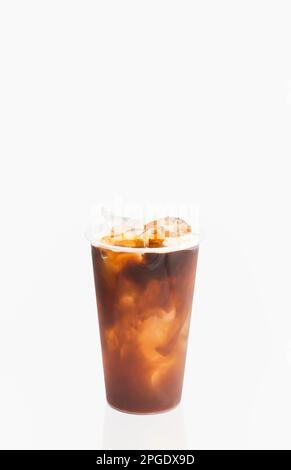 Iced black coffee Americano isolated on white backgroung in clipping path. Stock Photo