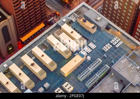 Large HVAC air conditioning units on the roof of the 200 Peachtree building in Atlanta, Georgia, USA, as seen from the Westin Peachtree Plaza Hotel. Stock Photo