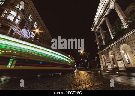 tram on the night street of the city Stock Photo
