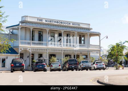 Martinborough Hotel, in Martinborough, a town in the South Wairarapa District, in the Wellington region of New Zealand. Cars parked in square Stock Photo