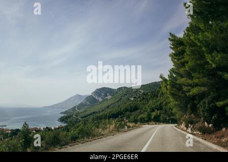 Mountain road over the abyss near Orebic in Croatia. Stock Photo