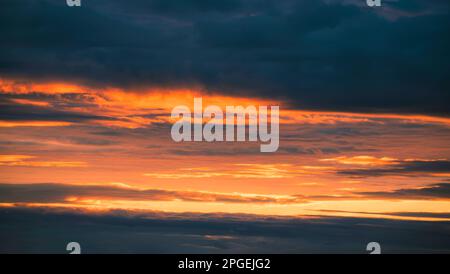 Beautiful colorful dramatic sky in the sunset Stock Photo