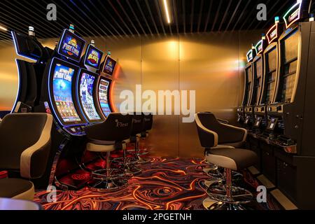 Nikolaev, Ukraine, - October 21, 2021: slot machines of the casino 'First' in the hotel 'Green Day'. Deluxe Game Club in the hotel. The interior of th Stock Photo