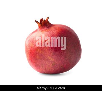 One ripe whole pomegranate on isolation close-up. Pomegranate fruit on a white background. Exotic healthy fruits. Useful foods for blood health. Stock Photo