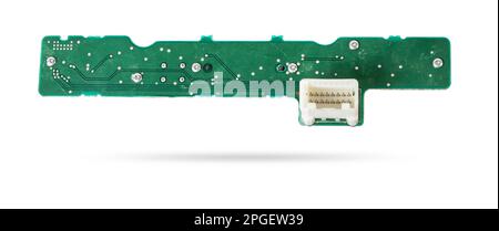 Green printed circuit board with transistors and microchips to control various devices Stock Photo