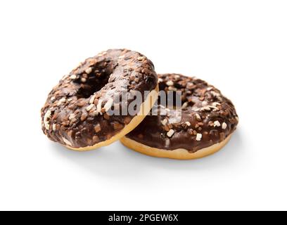 Donuts in chocolate isolated. Sweet breakfast. Dessert. Junk food. Two chocolate donuts on a white background. Stock Photo