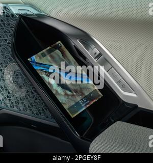 A touch panel that allows you to control all the car's functions is located on the rear door of the new, luxurious BMW 7 Series. Poland, Katowice, 14. Stock Photo