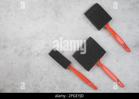 foam paint brush black sponge Stock Photo